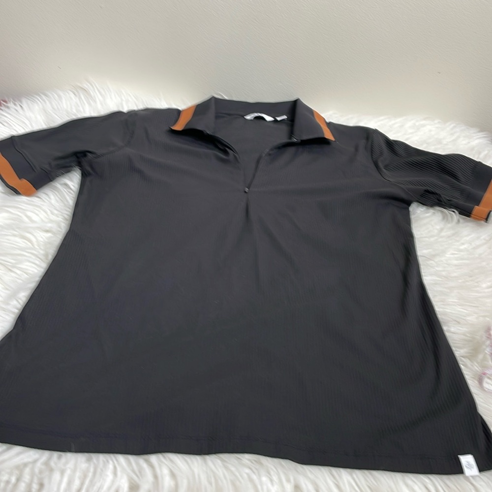 Lady Hagen size large  18 1/2 inches pit to pit